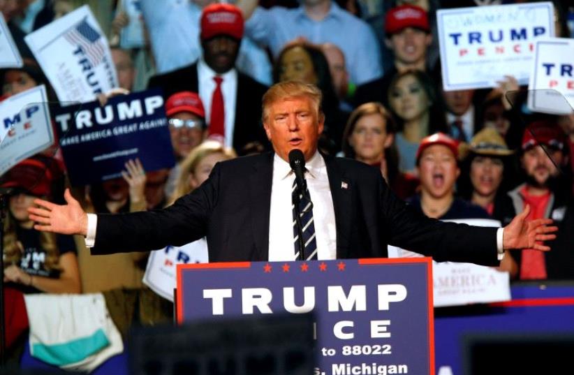 US Republican presidential nominee Donald Trump speaks at his final campaign event at the Devos Place in Grand Rapids, Michigan November 8, 2016.  (photo credit: REUTERS)