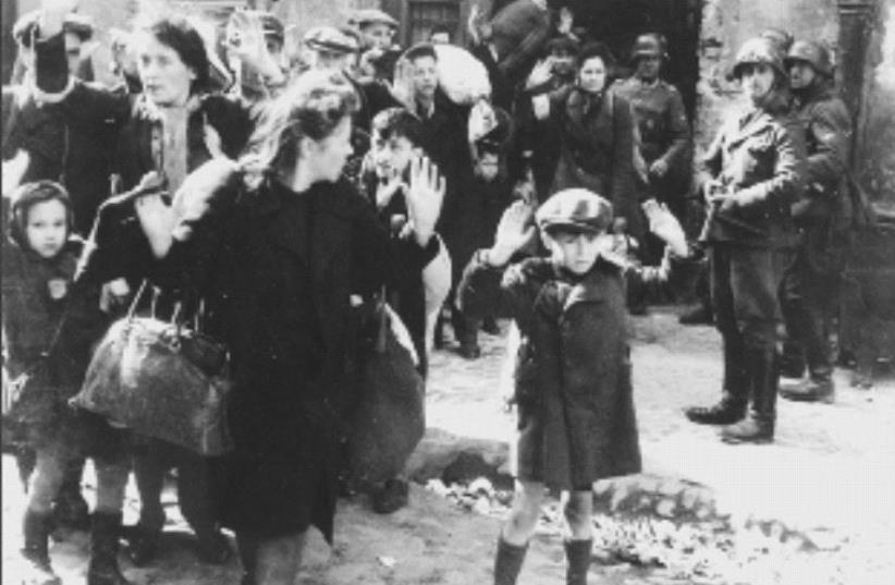 The "Warsaw Ghetto Boy" (photo credit: US HOLOCAUST MEMORIAL MUSEUM)