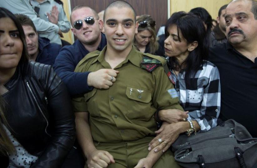 Elor Azaria sits to hear his verdict in a military court in Tel Aviv, Israel, January 4, 2017 (photo credit: REUTERS)