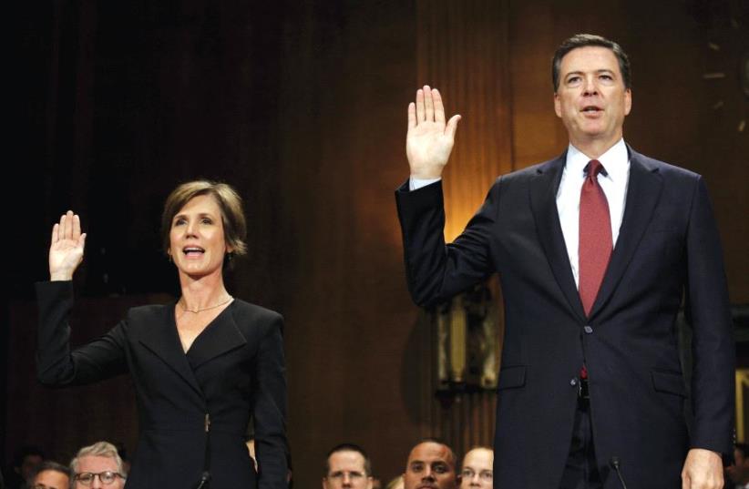 THEN US deputy attorney-general Sally Quillian Yates and FBI Director James Comey are sworn in to testify at a Senate Judiciary Committee hearing in Washington in 2015 (photo credit: REUTERS)