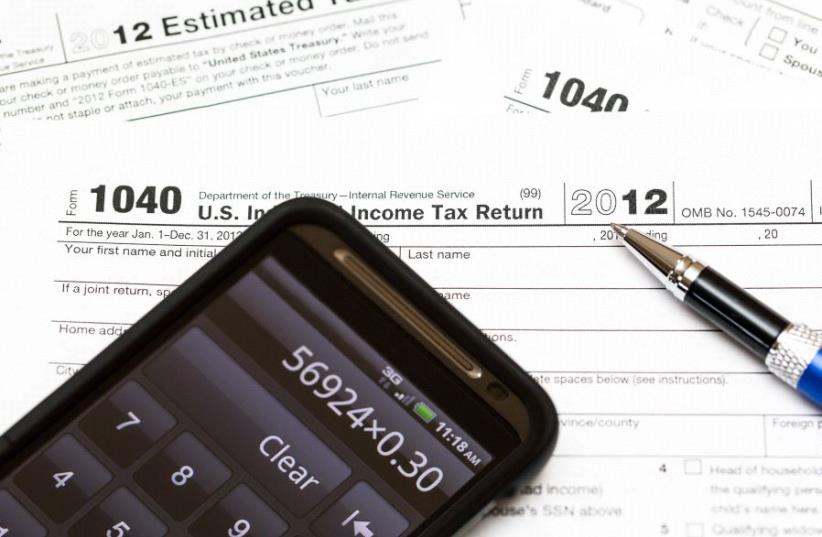 US tax form (illustrative) (photo credit: INGIMAGE)