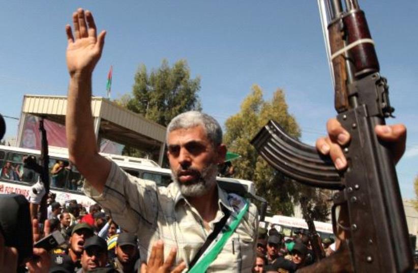 Yahya Sinwar arrives at the Rafah crossing between Egypt and Gaza on October 18, 2011, after being released by Israel as part of a prisoner swap for kidnapped soldier Gilad Schalit (photo credit: REUTERS)