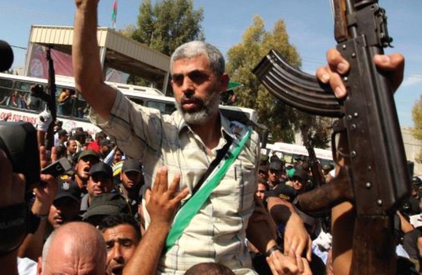 Yahya Sinwar arrives at the Rafah crossing between Egypt and Gaza on October 18, 2011, after being released by Israel as part of a prisoner swap for kidnapped soldier Gilad Schalit (photo credit: REUTERS)