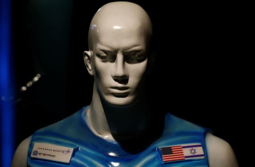 A sculpture of a man wearing Stemrad's new protective vest, Astrorad, is seen at an exhibit at Madatech, National Museum of Science Technology and Space in Haifa, Israel February 23, 2017. Picture taken February 23, 2017 (photo credit: REUTERS)