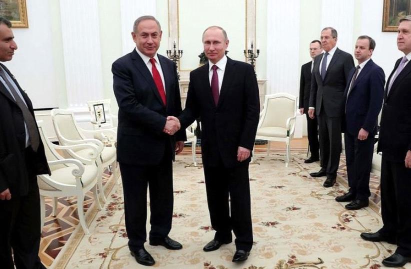 Prime Minister Benjamin Netanyahu (L) meets with Russian President Vladimir Putin in Moscow, March 9, 2017 (photo credit: KREMLIN PRESS SERVICE)