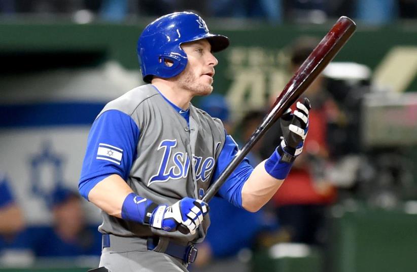 Israeli left fielder Blake Gailen reacts after his strikeout in the top of the eighth inning during the World Baseball Classic Pool E second round match between Israel and Japan at Tokyo Dome in Tokyo on March 15, 2017 (photo credit: TORU YAMANAKA / AFP)