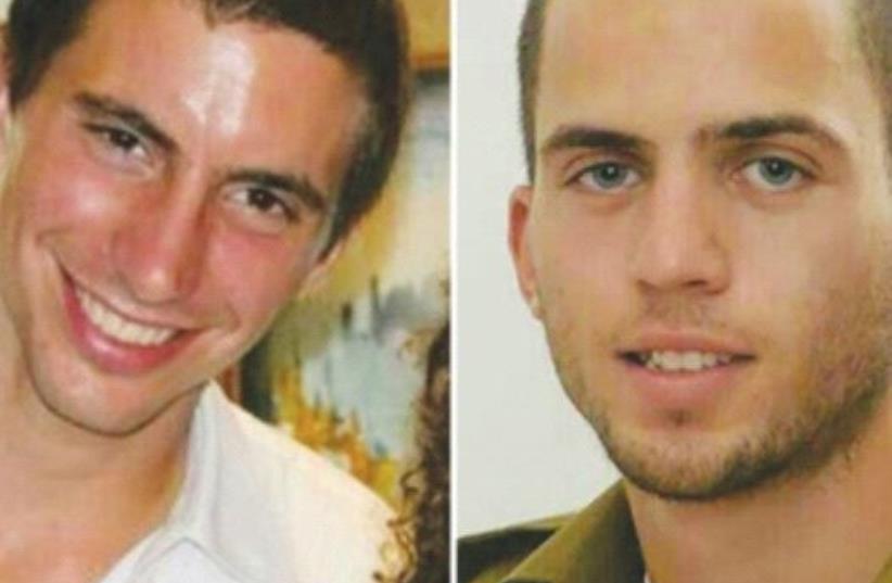 Lt. Hadar Goldin (left) and St.-Sgt. Oron Shaul were killed in action in the war against Hamas in 2014 (photo credit: Courtesy)