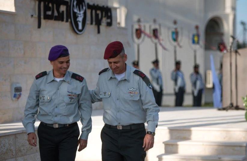 MAJ.-GEN. YOEL STRICK (left) walks with his predecessor at the Northern Command, Maj.-Gen. Aviv Kochavi, at the unit’s headquarters in Safed yesterday. (photo credit: IDF)