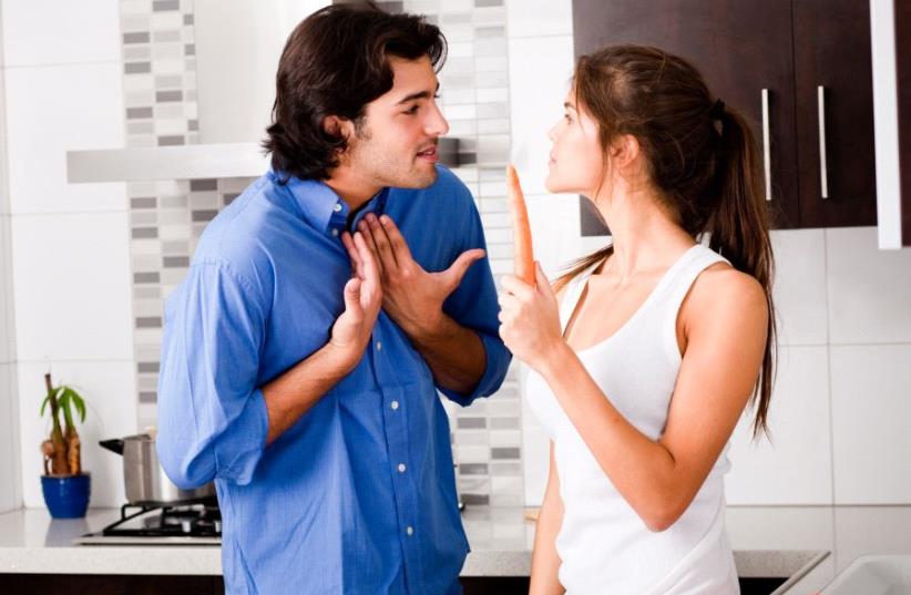 Young couple argue in the kitchen (illustrative) (photo credit: INGIMAGE)