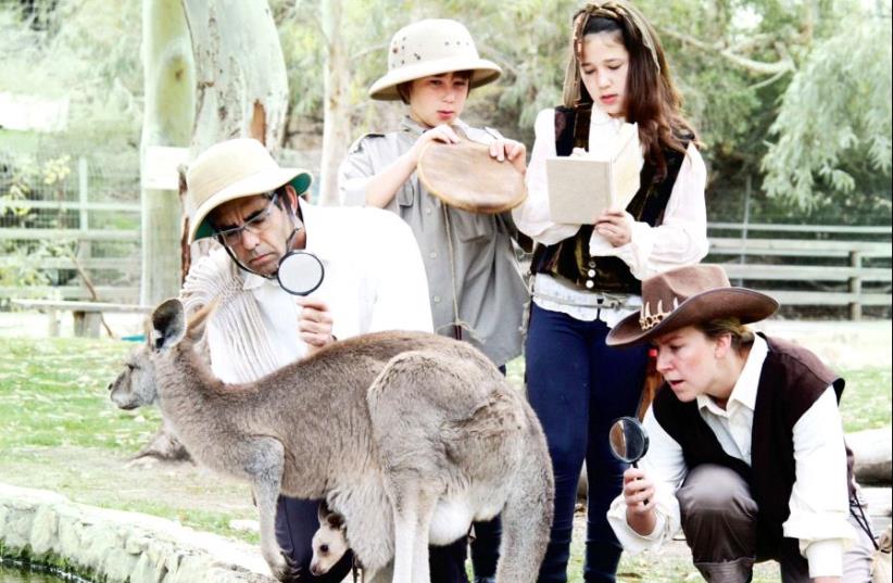 The festival at Gan Guru: Each child receives a nature investigator map (photo credit: NADAV KFIR)