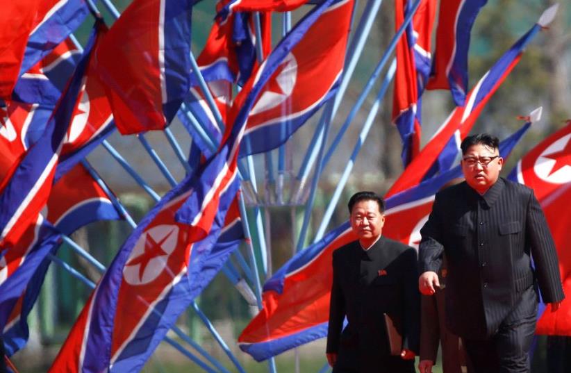 North Korean leader Kim Jong Un arrives for an opening ceremony of a newly constructed residential complex in Ryomyong street in Pyongyang, North Korea April 13, 2017 (photo credit: REUTERS)