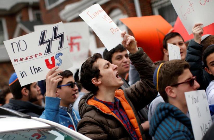 Students from Rambam Mesivta-Maimonides High School protest outside the home of Jakiw Palij in New York, U.S., April 24, 2017 (photo credit: REUTERS)