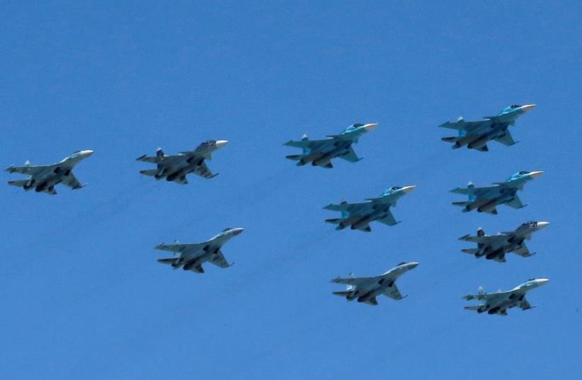 Russian Sukhoi Su military jets, including Su-35S Super-Flanker fighters. (photo credit: REUTERS/MAXIM SHEMETOV)