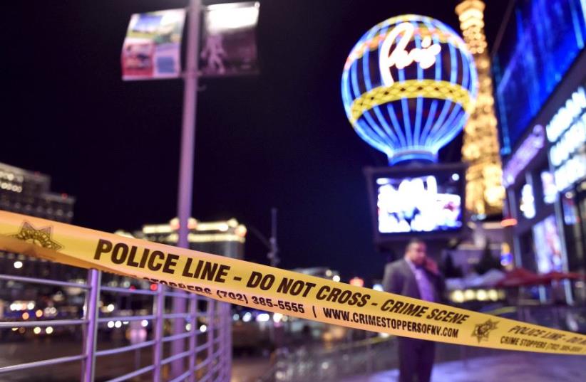 Police tape in Las Vegas [Illustrative] (photo credit: REUTERS)