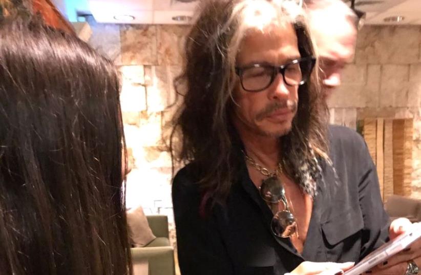 Aerosmith frontman Steven Tyler lands at Ben-Gurion Airport in Israel, May 13, 2017 (photo credit: HAI SHALOM)