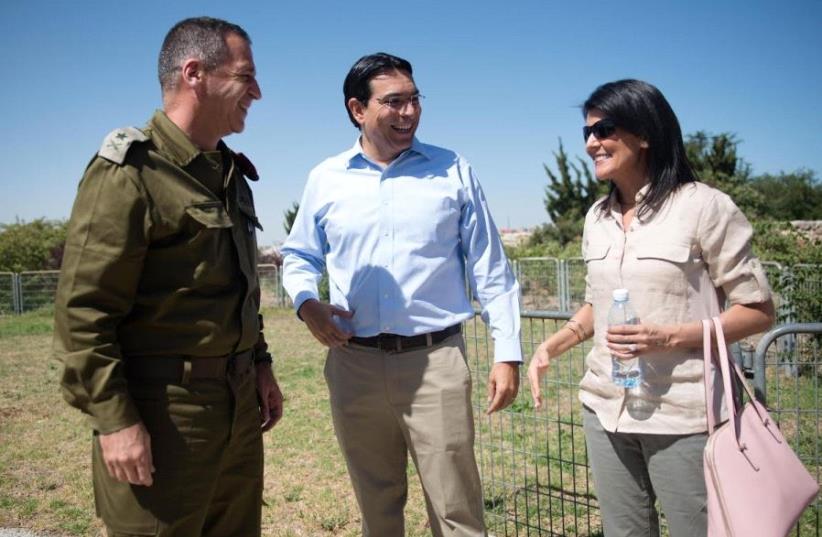 US Ambassador to the UN Nikki Haley in Israeli with Israel's Ambassador to the UN Danny Dannon and IDF Maj.-Gen. Aviv Kochavi (photo credit: IDF SPOKESMAN’S UNIT)