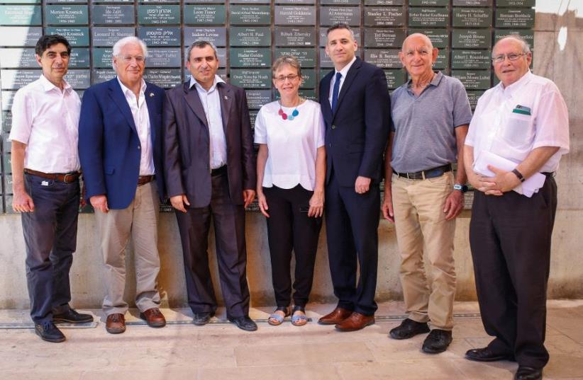 From the left: Simcha Goldin, US Ambassador to Israel David Friedman, Jerusalem & Heritage Affairs Minister Zev Elkin, Leah Goldin, Chief Israel Officer, JNF-USA Eric Michaelson, CEO of Ammunition Hill Katri Maoz, Vice President of the Supreme Court of Israel Elyakim Rubinstein (photo credit: JEWISH NATIONAL FUND – USA)