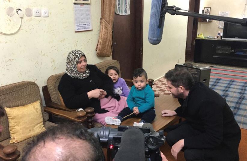 Nir Baram interviews a resident of the Palestinian village of Balata during the filming of ‘The Land Beyond the Mountains,’ a documentary that illustrates the lack of dialogue between ordinary Israelis and Palestinians (photo credit: COURTESY / SHULA SPIEGEL)