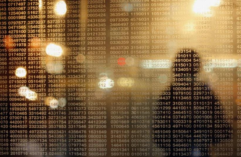 A girl visits the Holocaust Memorial following a candlelight vigil in Boston, Massachusetts December 21, 2006. (photo credit: "BRING BACK OUR BOYS" CAMPAIGN)
