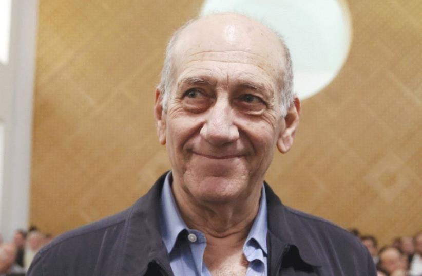 FORMER PRIME MINISTER Ehud Olmert waits for the judges at the Supreme Court in 2015 (photo credit: GALI TIBBON POOL/REUTERS)