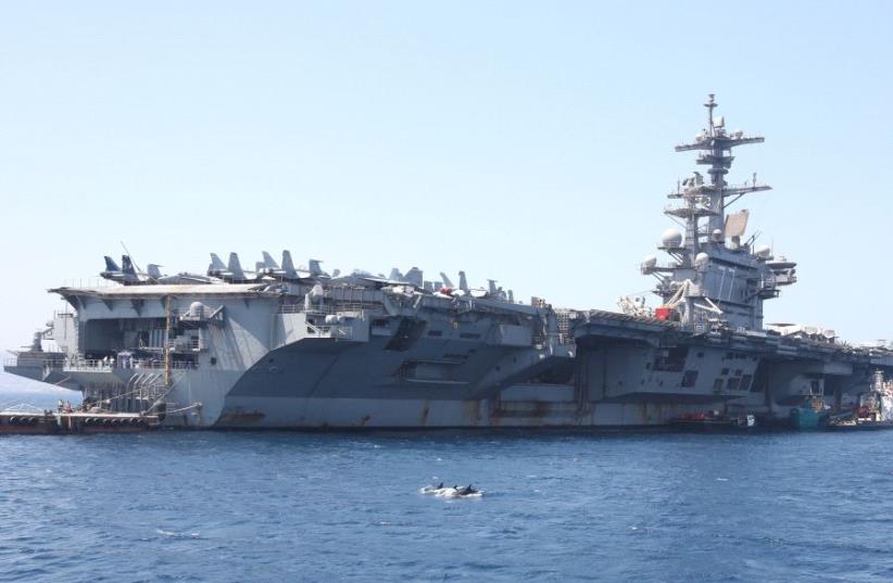 The USS George H.W. Bush docked in northern Israel's Haifa Port, July 3, 2017 (photo credit: MARC ISRAEL SELLEM/THE JERUSALEM POST)