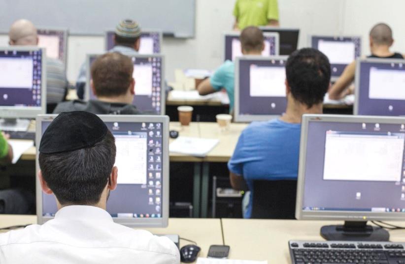 STUDENTS ATTEND a computer course at a technical college in Jerusalem (photo credit: REUTERS)