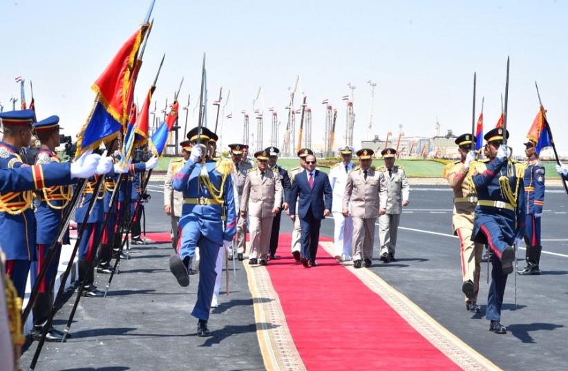 Egyptian President Abdel Fattah al-Sisi (C) arrives at the opening of the Mohamed Najib military base (photo credit: COURTESY OF THE EGYPTIAN PRESIDENCY)