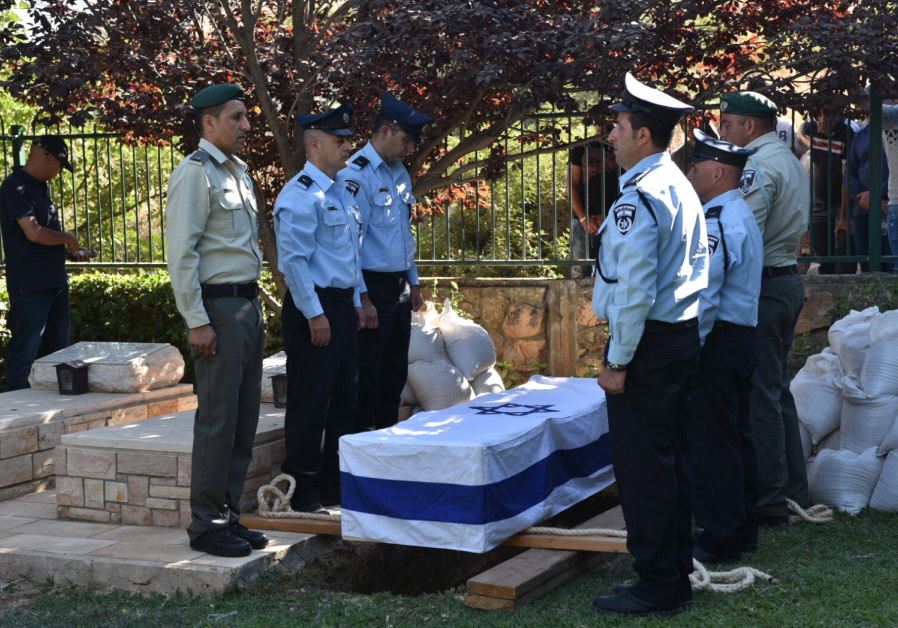 Hail Stawi, killed in a terrorist attack on the Temple Mount, is buried in the village of Maghar, July 14, 2017. (Israel Police)