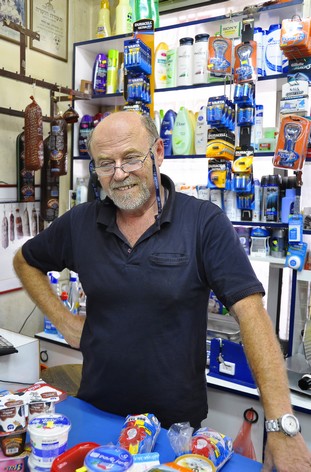 Portrait of Avi in his grocery store, Pardes Hanna