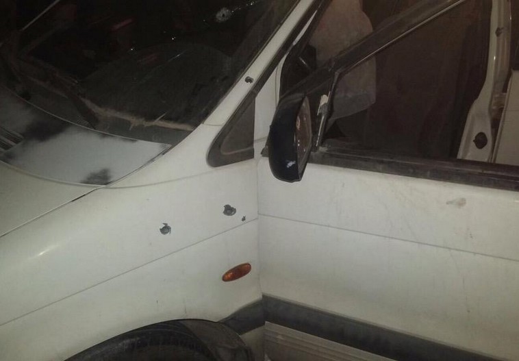 Bullet holes seen in the vehicle from shooting that left Israeli couple dead. Credit: IDF Spokesperson's Unit