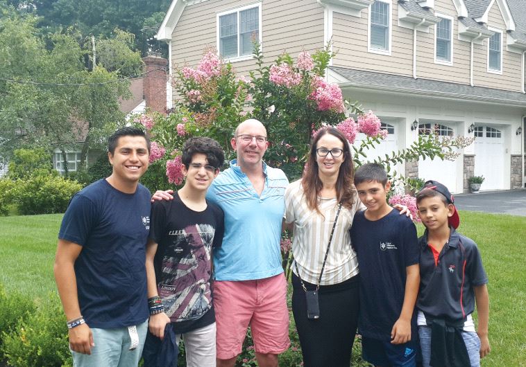 Volunteers including Dr. Yael Halaas and her husband (center) hosted participants on their three-week tour