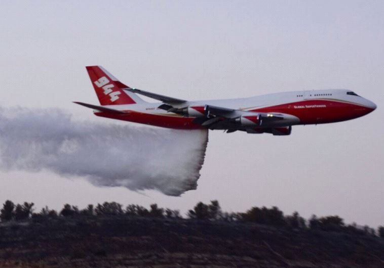 The Supertanker in action.(photo credit: POLICE SPOKESPERSON'S UNIT)