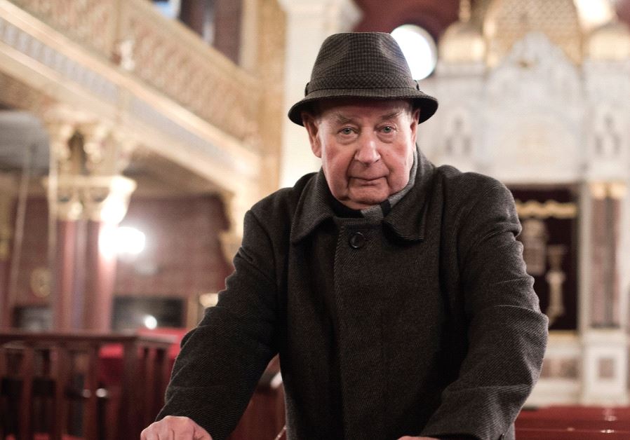 Every year on All Saints Day, Tadeusz Jakubowicz, head of the Krakow Jewish community, visits the graves of the Poles who helped save him and his family (photo credit: PIOTR SADURSKI)