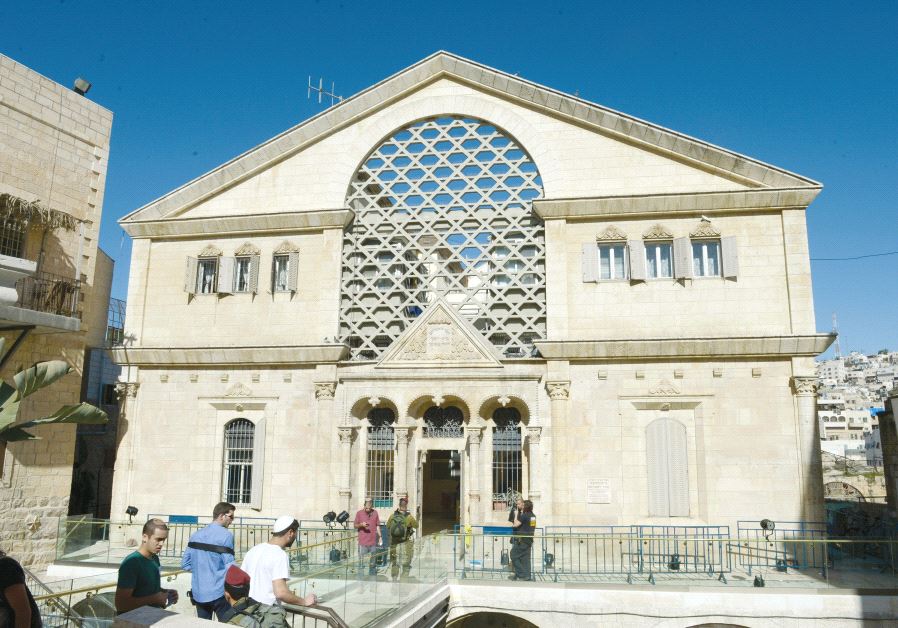 Beit Hadassah, one of the best known symbols of the Jewish settlement in the city, in 2015 during a visit by President Reuven Rivlin. (MARK NEYMAN / GPO)