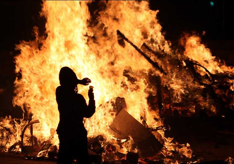 A bonfire seen on Lag Ba'omer (credit: MARC ISRAEL SELLEM/THE JERUSALEM POST)