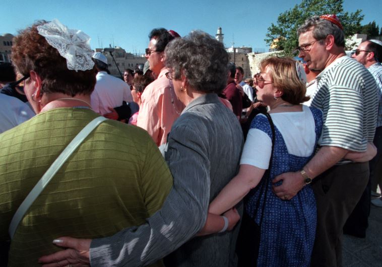 American Jews who are members of the Union for Reform Judaism, formerly the Union Of American Hebrew Congregations at the Western Wall in Jerusalem‏. (credit: REUTERS)