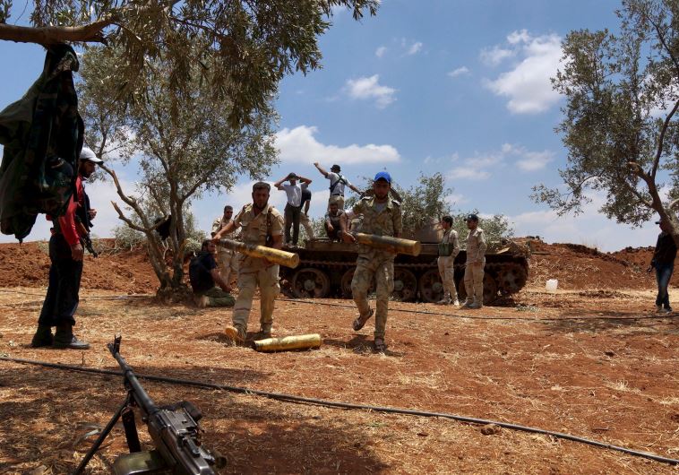 Syrian rebels prepare for fighting in Syria  (credit: REUTERS/STRINGER)