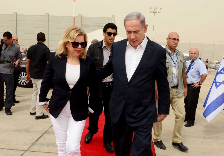 Benjamin and Sara Netanyahu at Ben Gurion Airport (credit: PRIME MINISTER'S OFFICE)