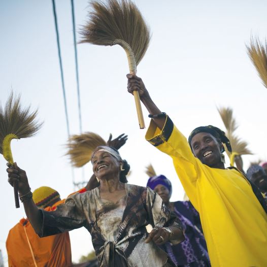 Members of the Black Hebrews dance as they take part in celebrations for Shavuot in Dimona (credit: REUTERS)