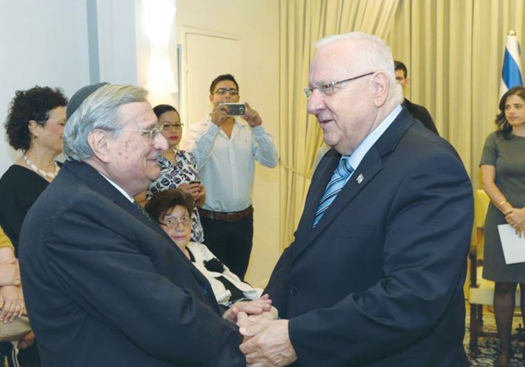 PRESIDENT REUVEN RIVLIN (right) congratulates former Supreme Court justice Yaakov Turkel yesterday upon his receiving the third annual Distinguished Scholar of Jewish Law award established by the Israel Bar Association. (credit: GPO)