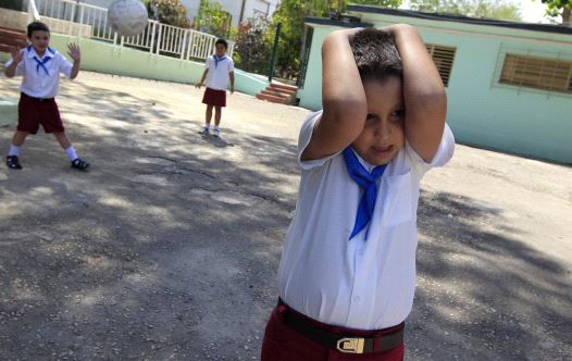 A child with autism plays with other children (file) (credit: REUTERS)