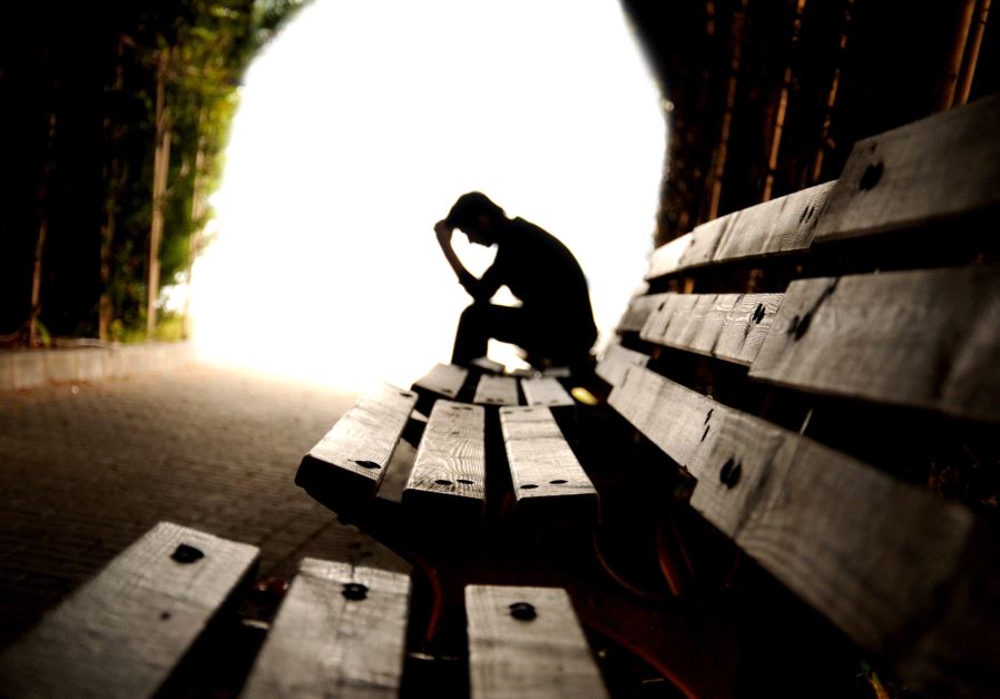 Sad person in tunnel (illustrative) (credit: INGIMAGE)