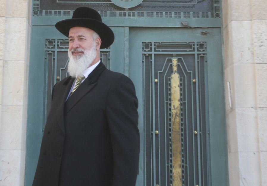 Former chief rabbi Yona Metzger leaves a Jerusalem court last March (credit: MARC ISRAEL SELLEM)