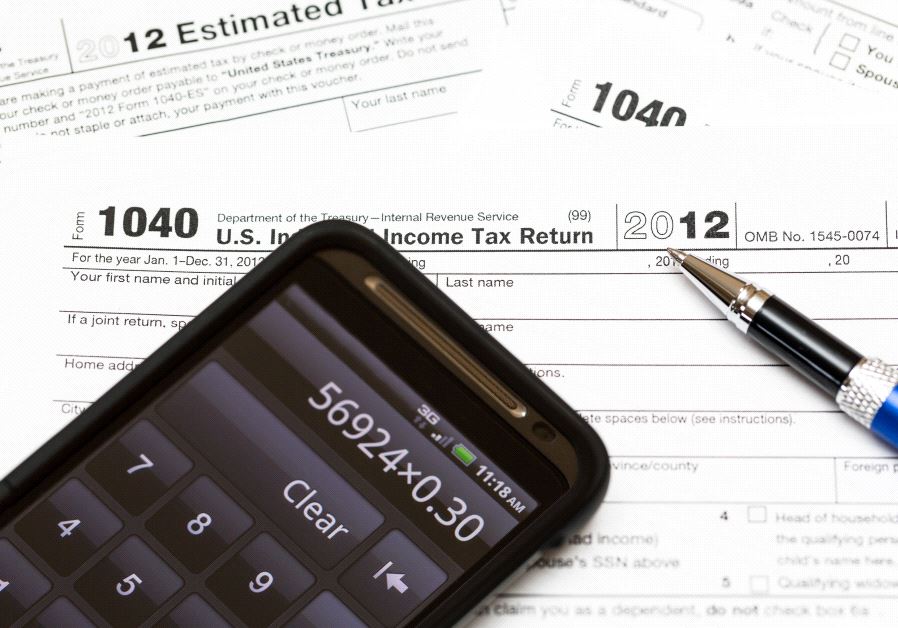 US tax form (illustrative) (credit: INGIMAGE)