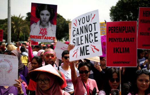 People take part in a rally calling for women's rights and equality ahead of International Women's Day in Jakarta, Indonesia, March 4, 2017 (credit: REUTERS)