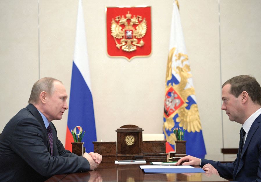 RUSSIA’S PRESIDENT Vladimir Putin meets with Prime Minister Dmitry Medvedev at the Novo-Ogaryovo state residence outside Moscow. (credit: REUTERS)