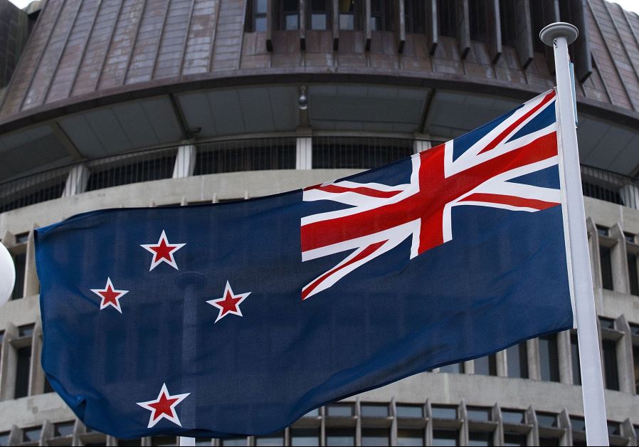 The current New Zealand flag flies on Parliament buildings in Wellington's Central Cusiness District on March 24, 2016. (credit: AFP PHOTO)