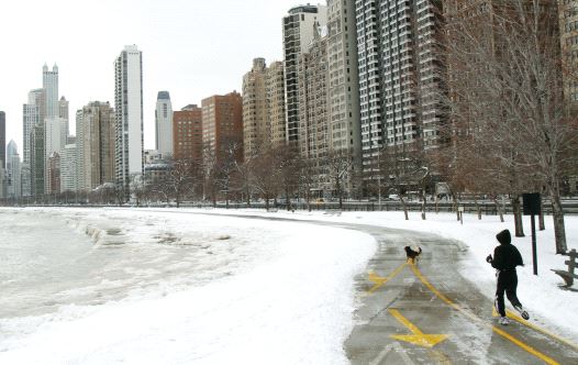 A man runs along Lake Michigan in Chicago in 2010 (credit: REUTERS)