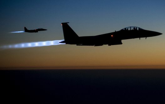 A pair of US Air Force F-15E Strike Eagles fly over northern Iraq after conducting airstrikes in Syria (credit: REUTERS)