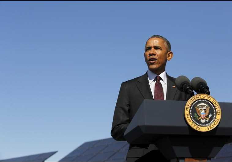 US President Barack Obama delivers remarks on clean energy after a tour of a solar power array at Hill Air Force Base, Utah